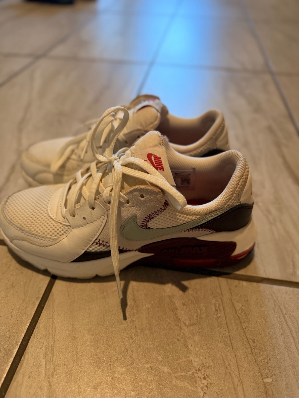 Nike White Sneakers with Mint Swoosh and Maroon Accents